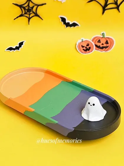 The same oval tray, this time with a cute ghost. These trays are lightweight and spill-proof.