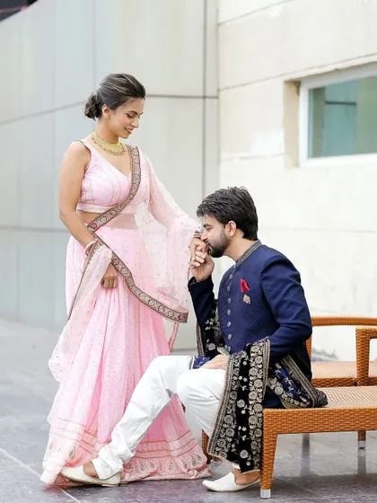A chivalrous gesture that speaks of love and respect. These romantic poses make for timeless and heartwarming pre-wedding photographs.