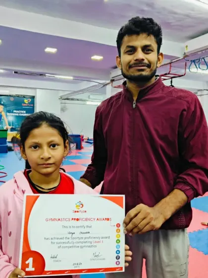 This student has earned her Level 1 Gymnastics Proficiency Award.