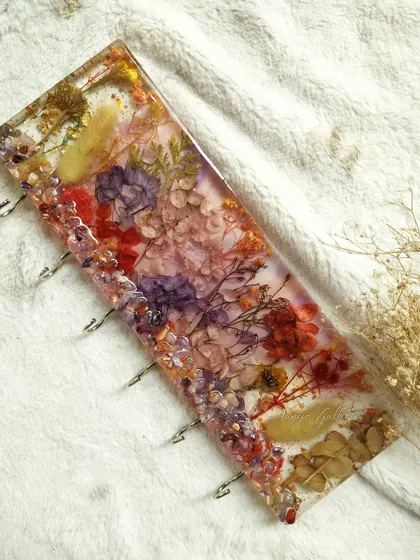 My new Blooming Key Holder, a functional art piece with real flowers encased in resin, perfect for your hallway.