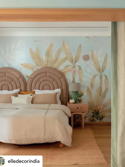 Another view of the kids' bedroom from the Elle Decor feature, highlighting the beautiful hand-painted wallpaper by Kalakaari Haath.