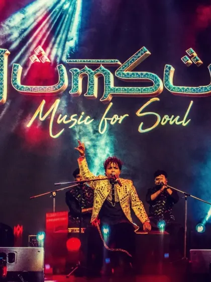 A classic Humsufi pose. Our lead vocalist under our name, commanding the stage.