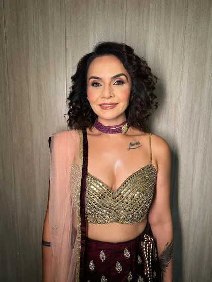 A happy and confident wedding guest. The makeup is designed to last all night while feeling comfortable and looking flawless in photos.