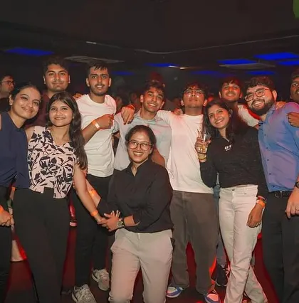 A happy group photo from the dance floor.