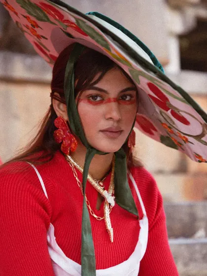 A close-up portrait focusing on the accessories.