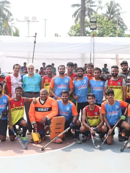 Our full men's squad, including players and officials, poses for a group photo at a local tournament. We compete as a unified and supportive team.
