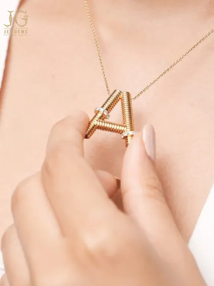 Your story is what makes a piece of jewellery truly precious. I love creating personalised initial pendants like this one, where your identity is sculpted in gold and accented with diamonds. It’s a modern heirloom that is completely and uniquely yours.