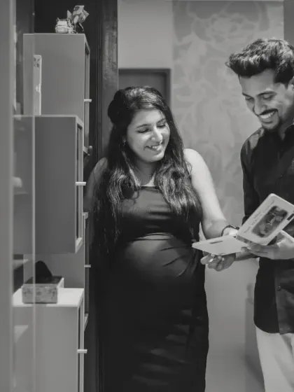 Another angle of a sweet, candid moment. These black and white photos have a timeless quality that makes the memory even more special.