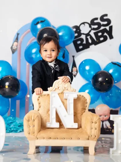 Standing tall and proud to be one! A great shot from a 'Boss Baby' first birthday session.