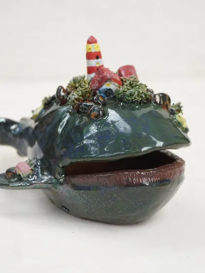 A sneak peek of the composite forms created in our Miniature Workshop. These whimsical pieces, like a whale with a lighthouse on its back, show how combining small elements can create a magical, narrative sculpture.