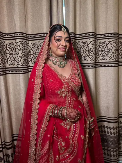 The final look with the dupatta set perfectly. I ensure every element, including the draping, is flawless so the bride can walk into her ceremony feeling confident and beautiful.