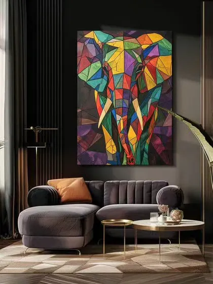 A modern, geometric elephant painting that uses a vibrant palette to create a stained-glass effect. This is a contemporary take on a classic symbol of strength and wisdom.