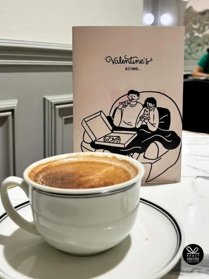A Valentine's zine we created, filled with love stories and poetry, showcasing our ability to create unique, custom paper goods.