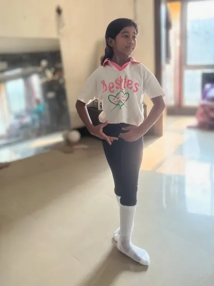 Students practicing splits and leg extensions in my ballet class. These exercises are crucial for developing the flexibility required for ballet.