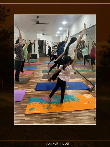A young student gracefully holds Natarajasana, showing great focus and stability.