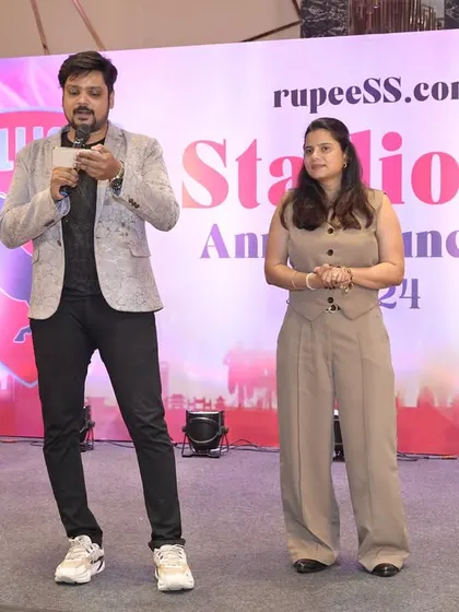 Co-hosting a segment on stage. I am adaptable and work well with other presenters to create a dynamic and seamless experience for the audience.