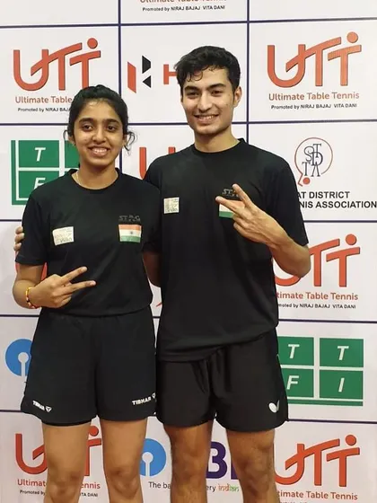 The winning pair celebrating their victory.