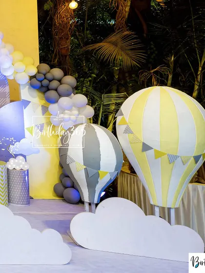 A nighttime view of the hot air balloon props, creating a magical, glowing scene.