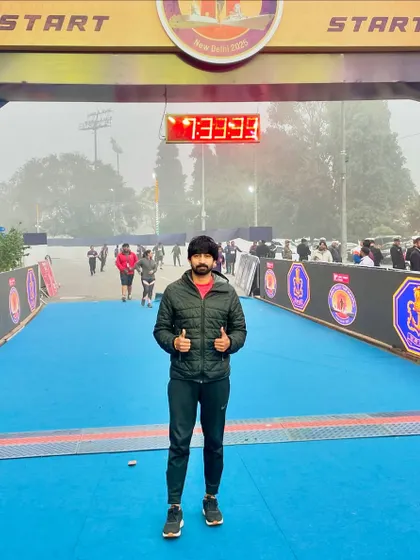 At the finish line of the Indian Navy Marathon in New Delhi. I am present from start to finish, managing the event and ensuring everything runs on schedule.