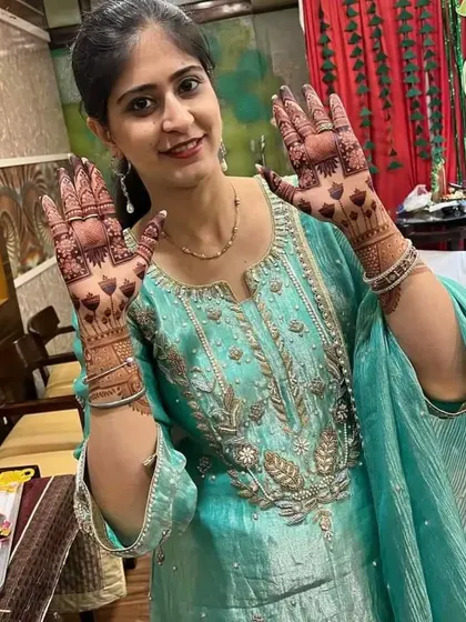 The same client showing a different pose, this time with a heart-themed design.