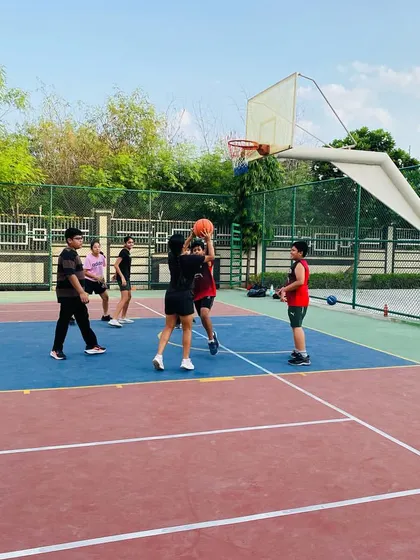 A female player takes a shot during a morning session.