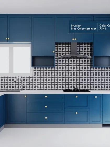 For a client who dreamed of an English countryside kitchen, I used Prussian Blue profile shutters and a checkered backsplash. The champagne gold knobs and Terrazzo countertop add a touch of modern luxury to the classic design.