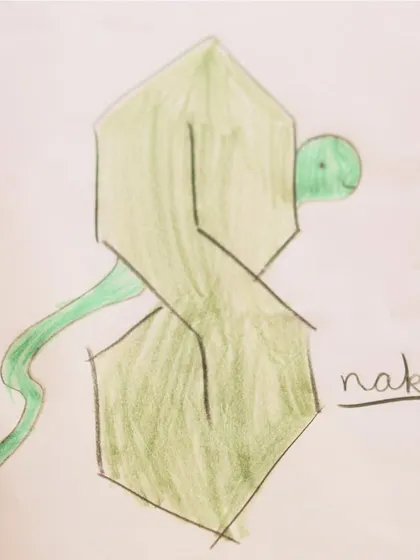 A "nake" (snake) drawn by Samara. We cherish the creative and wonderfully imperfect art that our children produce.
