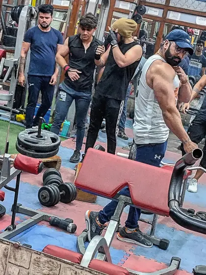 In the zone at the gym. Every session is a chance to get better. This is the environment where we forge results, surrounded by iron and ambition.