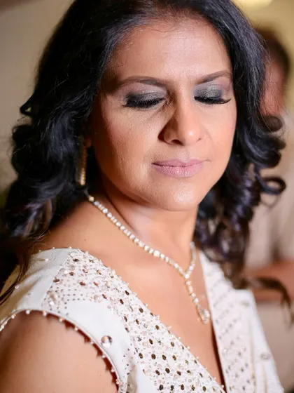 A close-up of the smokey eye makeup. I use techniques that define the eyes beautifully without being too harsh on mature skin.