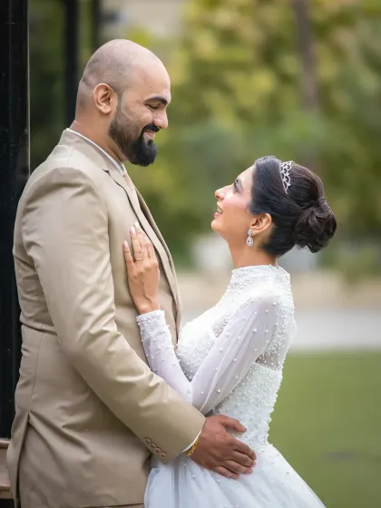 The look of love. This close-up wedding portrait beautifully captures the adoration and happiness shared between the bride and groom.
