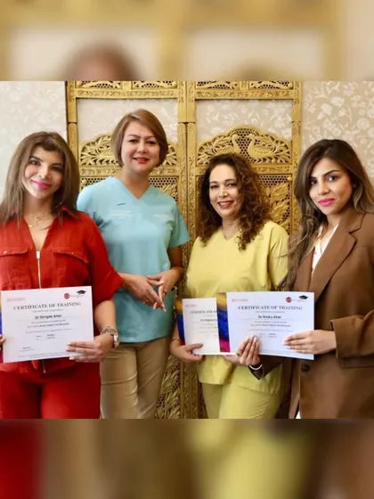 With fellow doctors, proudly holding our certificates of training after the Belotero fillers workshop. Continuous learning is key.