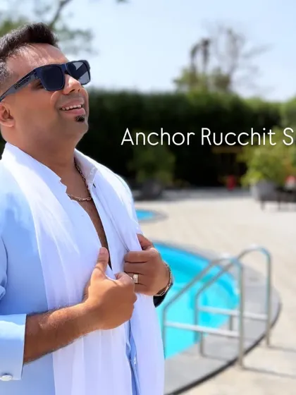 Enjoying the sun before a wedding carnival. My style is versatile, just like my hosting, fitting everything from grand stages to relaxed outdoor settings.