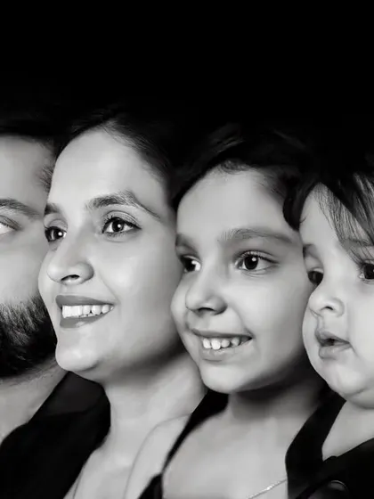 A unique and artistic black and white profile shot of the whole family. This style of portrait is timeless and focuses purely on the faces and connection of the family.