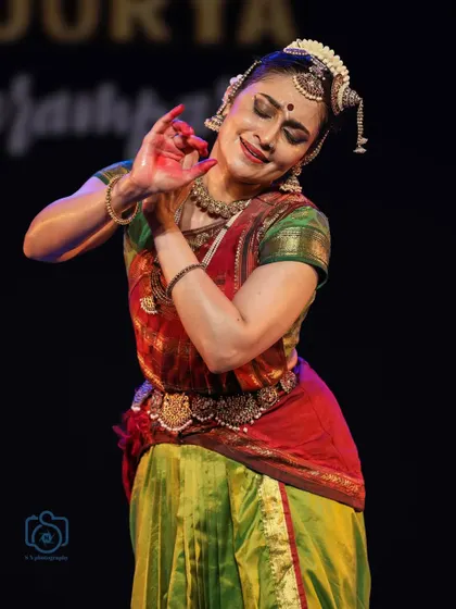 A moment of ecstatic devotion, with eyes closed in blissful surrender, from the Soorya Parampara Festival.