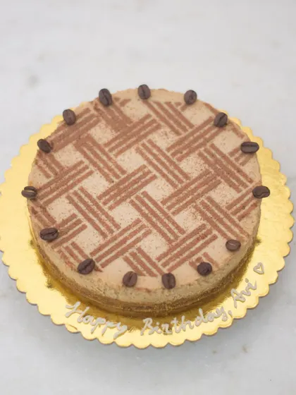 This boozy coffee cheesecake is my personal favorite, and I'm sure you'll be dreaming about it once you have a taste. The stencil pattern on top adds a simple but elegant touch.