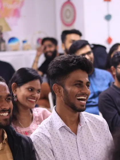 More smiles from the crowd at our Kannada open mic.