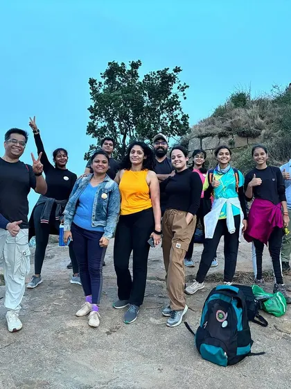 Another happy group at Skandgiri. We believe the best views come after the hardest climbs, a lesson that applies in nature and in business.