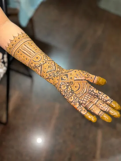 This is a detailed view of my intricate bridal henna work. Each design is unique, combining traditional patterns like paisleys and mandalas with fine-line fillers to create a stunning, full-coverage look for your special day.
