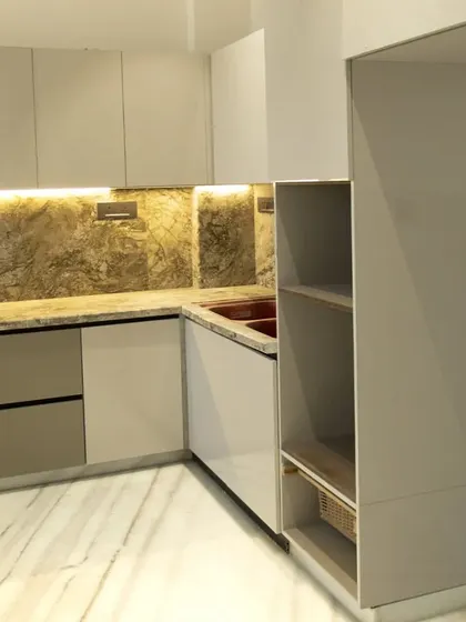 Another angle of our proposed Delhi kitchen project, showing the seamless integration of the sink area and the open shelving unit for easy access to everyday items.