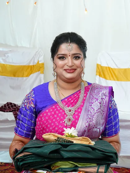 A portrait of the bride-to-be during the ceremony. The makeup is designed to be long-lasting and picture-perfect throughout the event.