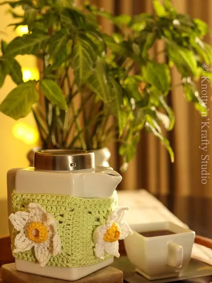 Tea time with my Daffodil Tea Cosy. The cheerful flowers are sure to brighten any afternoon.