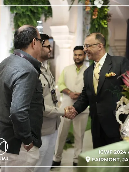 A warm handshake at the ICWF event. Building strong relationships within the industry is as important to me as building relationships with my clients.