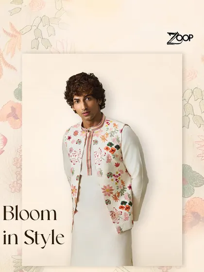 Bloom in style with this nature-inspired Nehru jacket. The beautiful floral embroidery on an off-white base captures the essence of the Vanderphool collection in every thread.
