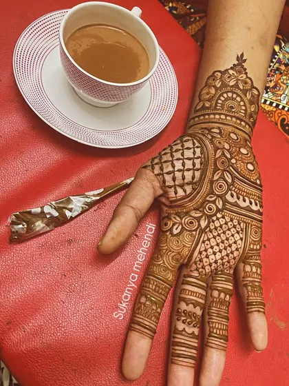 There's something special about sipping warm chai while getting mehendi done. It's a moment of peace and tradition, and I love creating that experience for my clients.
