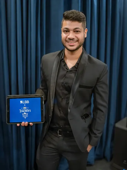 Proudly displaying the logos of LBB and Teacher's Whisky on my iPad for a branded digital magic show.