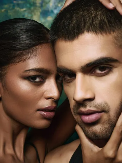 An extreme close-up of a couple, focusing on the skin texture and the intimacy of the moment. The lighting is soft and even, ideal for showing natural-looking skin.