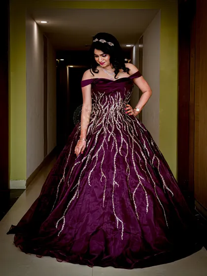 A slightly different pose in the same hallway setting, this portrait captures a moment of quiet elegance. We explore different angles and poses to provide a diverse gallery of images.