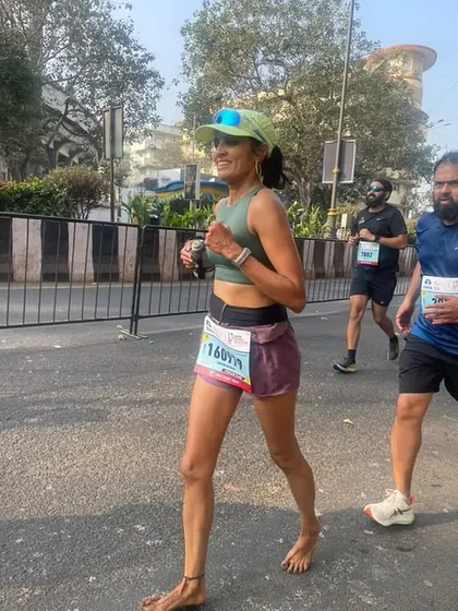 Taking a walk break during the marathon. It is important to listen to your body during a race. Smart racing is more important than a fast start.