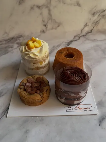 This Father’s Day, say “thank you” with layers of deliciousness. This assorted box features four different individual desserts, including cakes and a cookie.