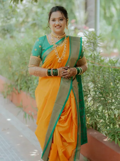 The elegance of a Nauvari saree is unmatched. I styled this bride with a traditional drape and a makeup look that enhanced her natural grace and beauty.